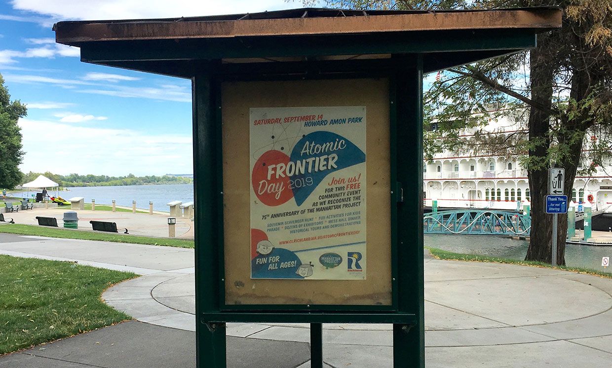 A poster advertises Atomic Frontier Day celebrations at Howard Amon Park in Richland, Wash.