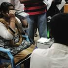 Photo of residents of Bangalore and Delhi, India, being provided with iris scan.