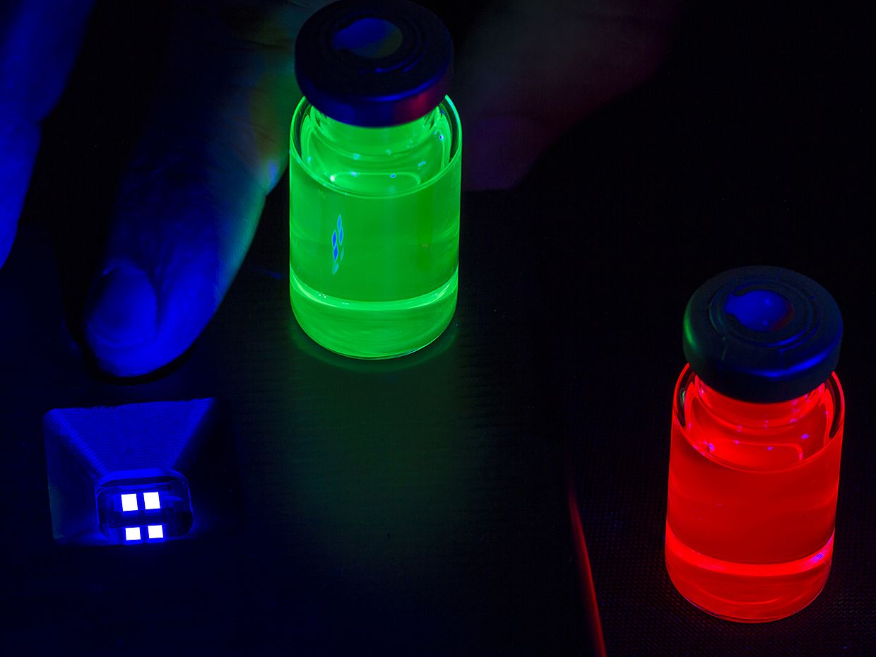 photo showing glowing vials