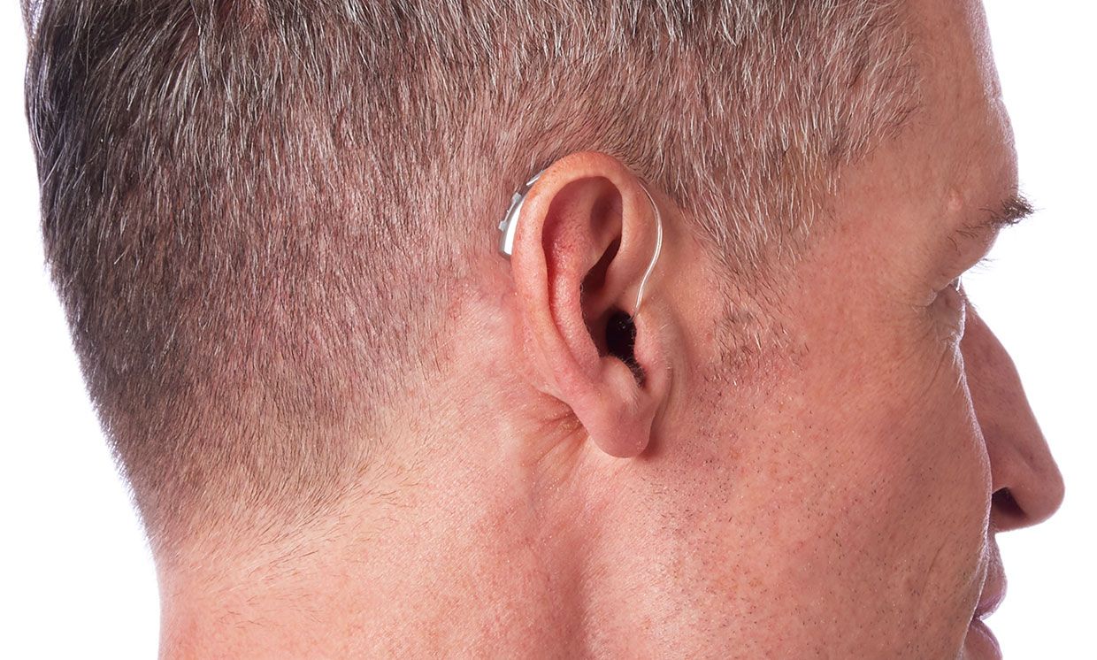 Livio AI hearing aid on a man.