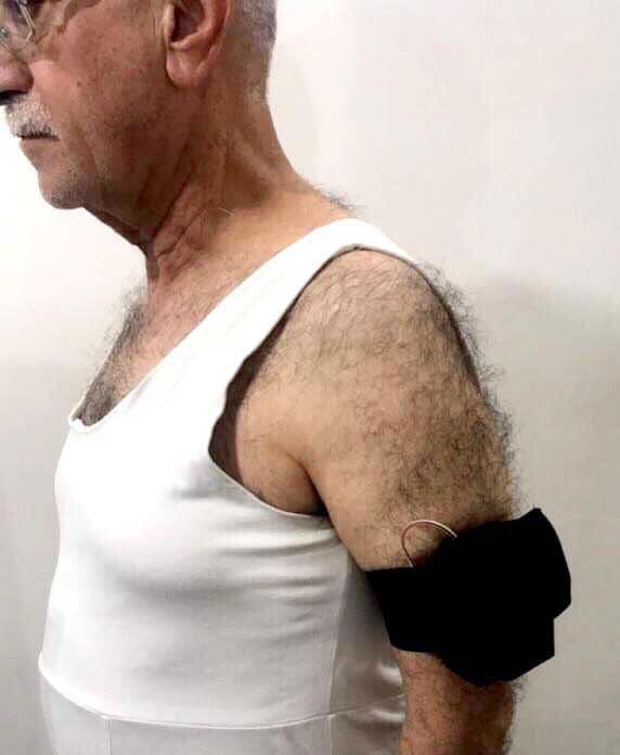 The wearable device on a man's arm