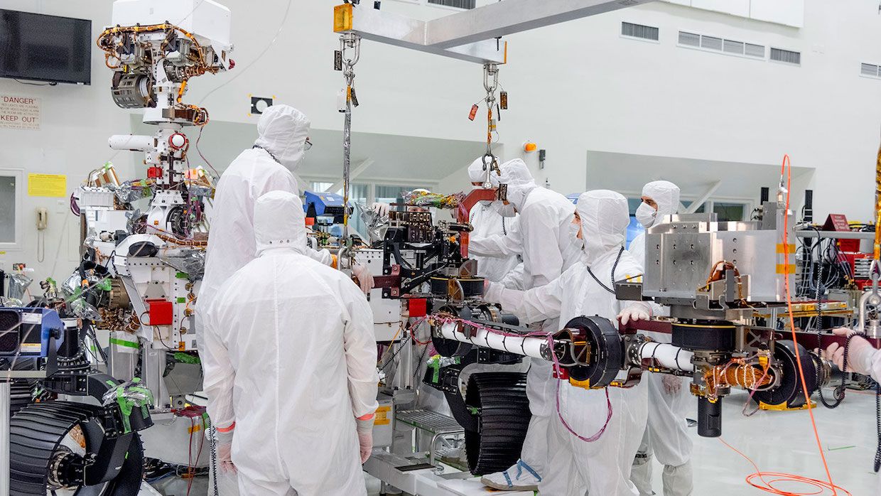 NASA JPL engineers install robot arm on Mars 2020 rover