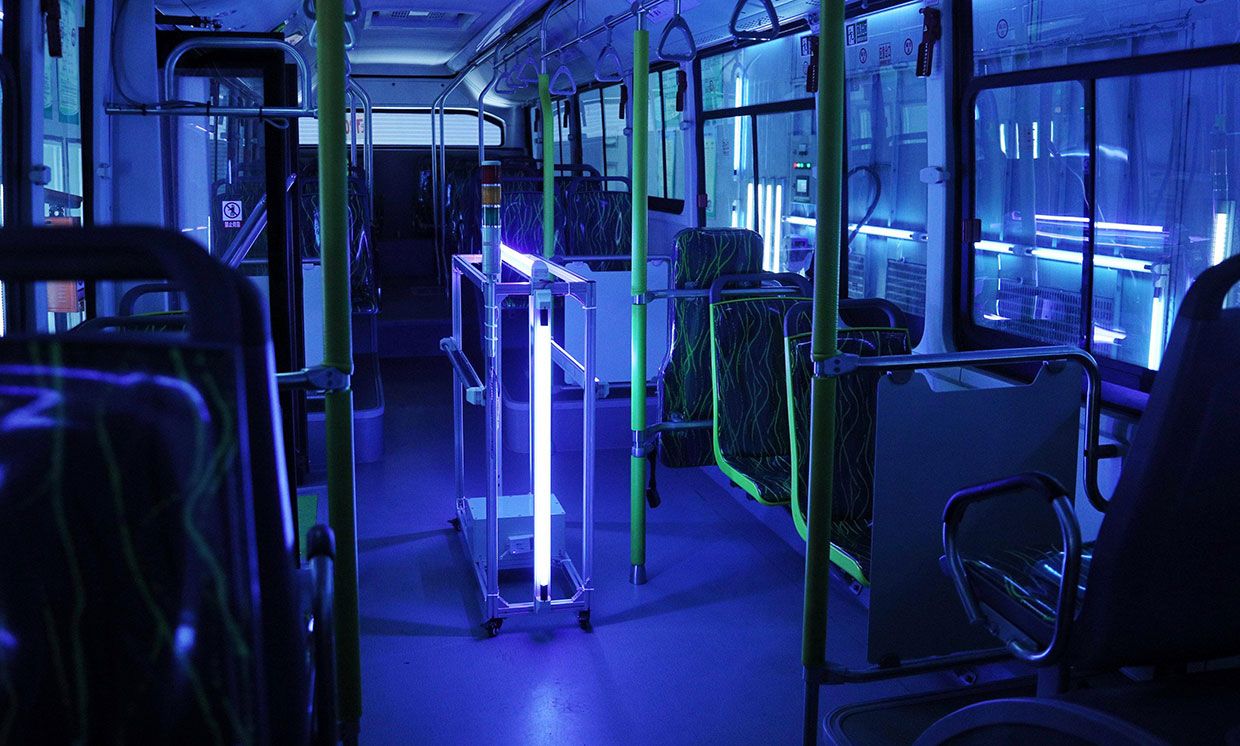 A bus in Shanghai is disinfected with UV light, to help slow the spread of the virus that causes COVID-19.