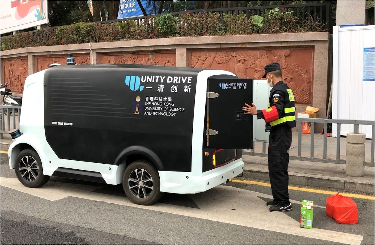 Self-driving vehicle developed by Unity Drive Innovation (UDI) delivers meals to checkpoint workers