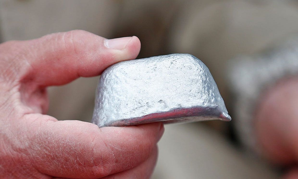 Kurt Koehler of AlGalCo holds an aluminum alloy pod. Adding water causes it to react and become hydrogen. The hydrogen is used to fuel the engine.