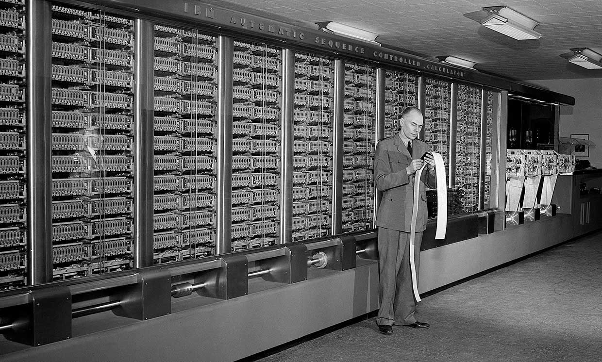 Mathematician Howard Aiken with his Early Computer Howard Aiken's early computer, created for IBM, is presented to Harvard University to be used by the US Navy during WWII.