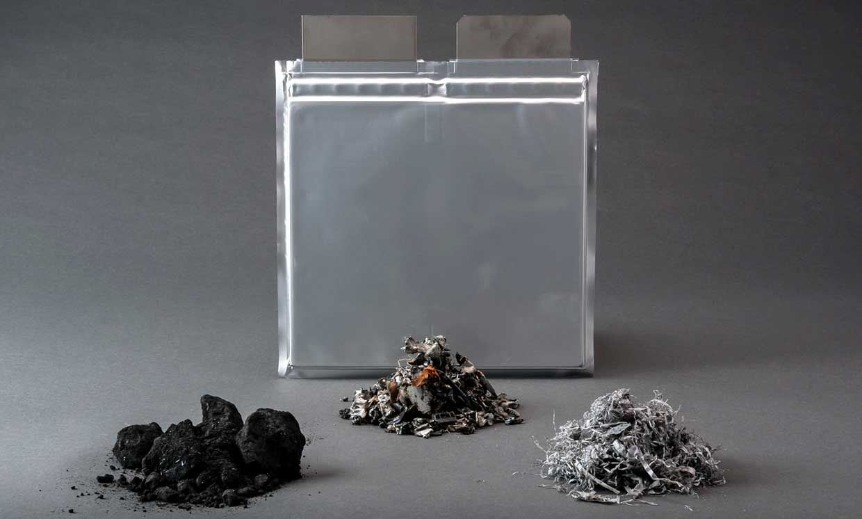 Photo of a silver battery image and 3 piles of materials. 