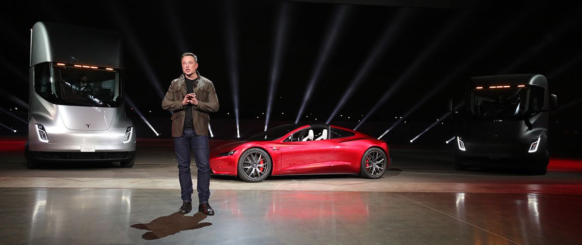A big rig and a sports car point Tesla in the direction Elon Musk has envisioned