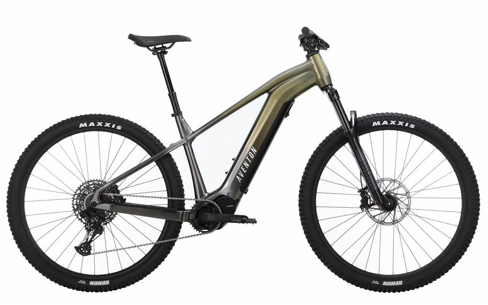 A black and gold electric bike with tall thick tires