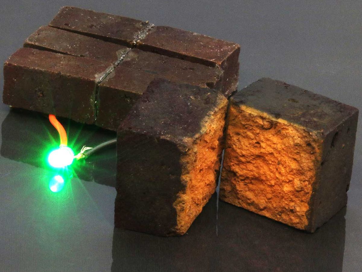 A brick supercapacitor powering an LED light.