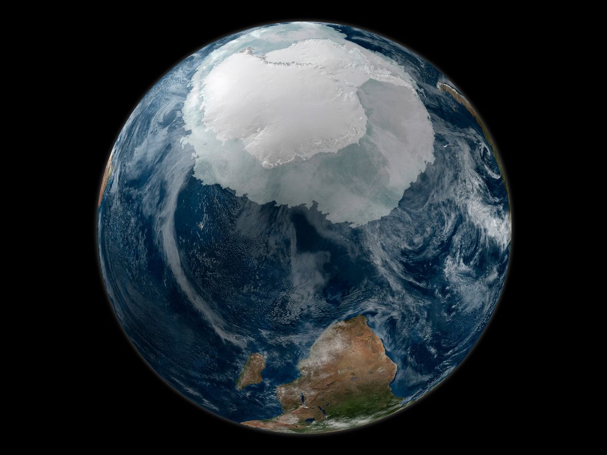 a circle view of Earth and Antarctica against a black background