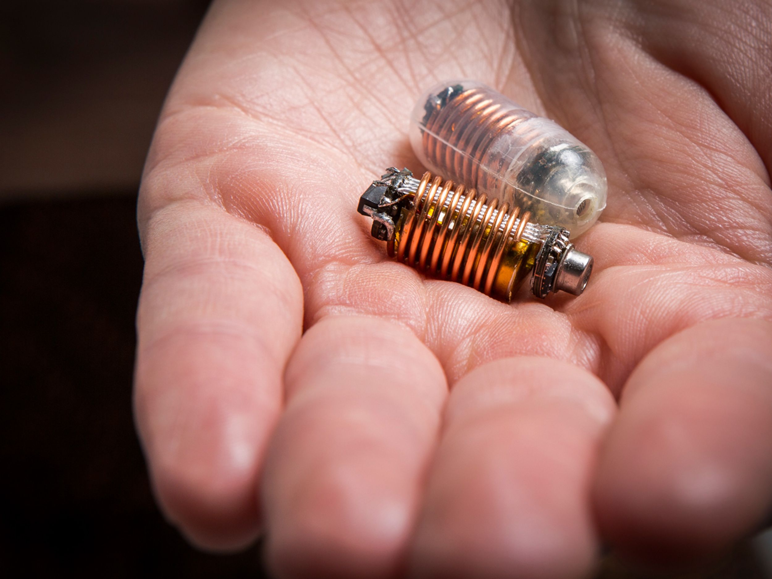 A close-up photo shows someone holding the gas pill in their hand.