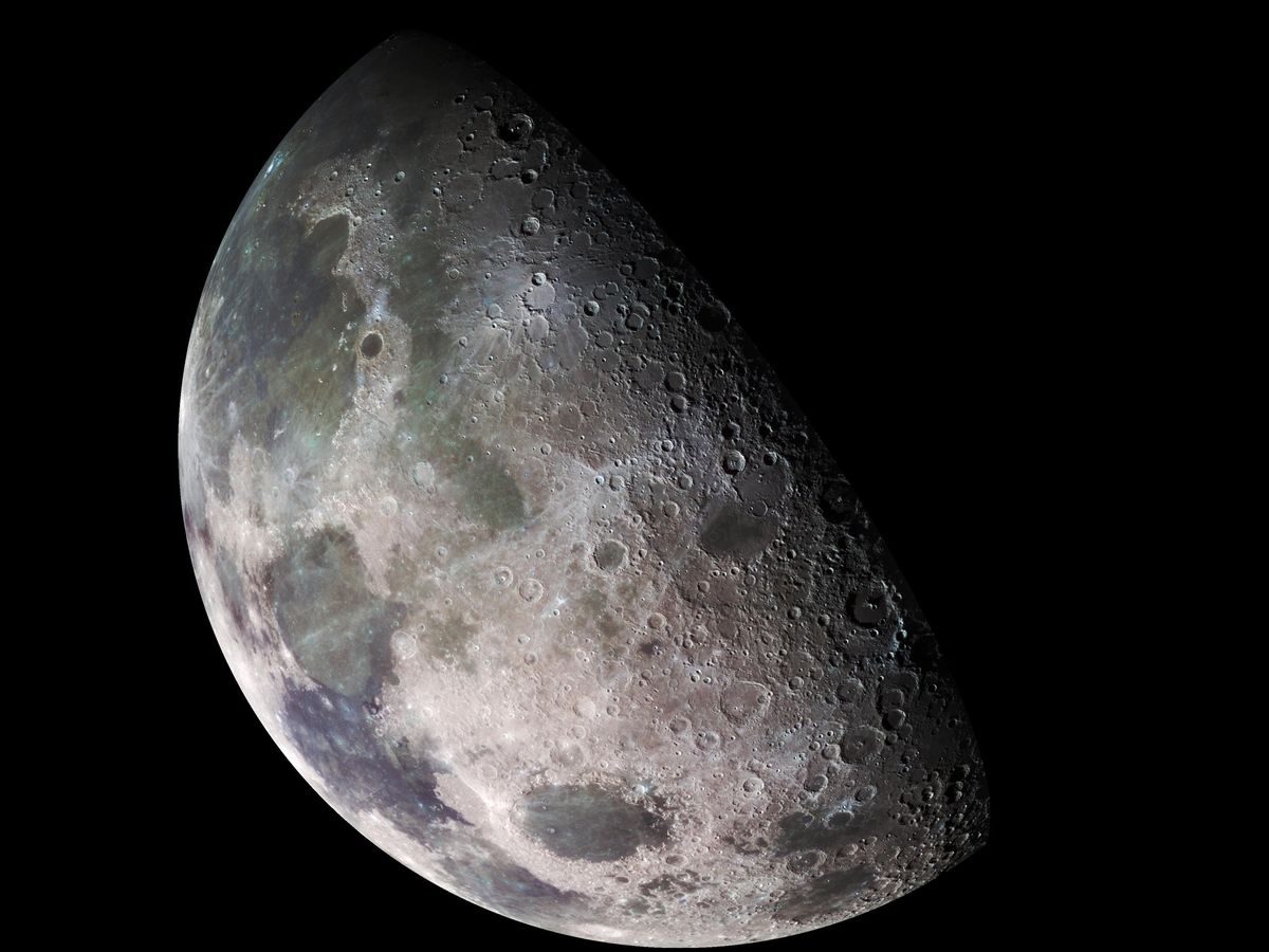 A closeup photograph of a half-full moon.