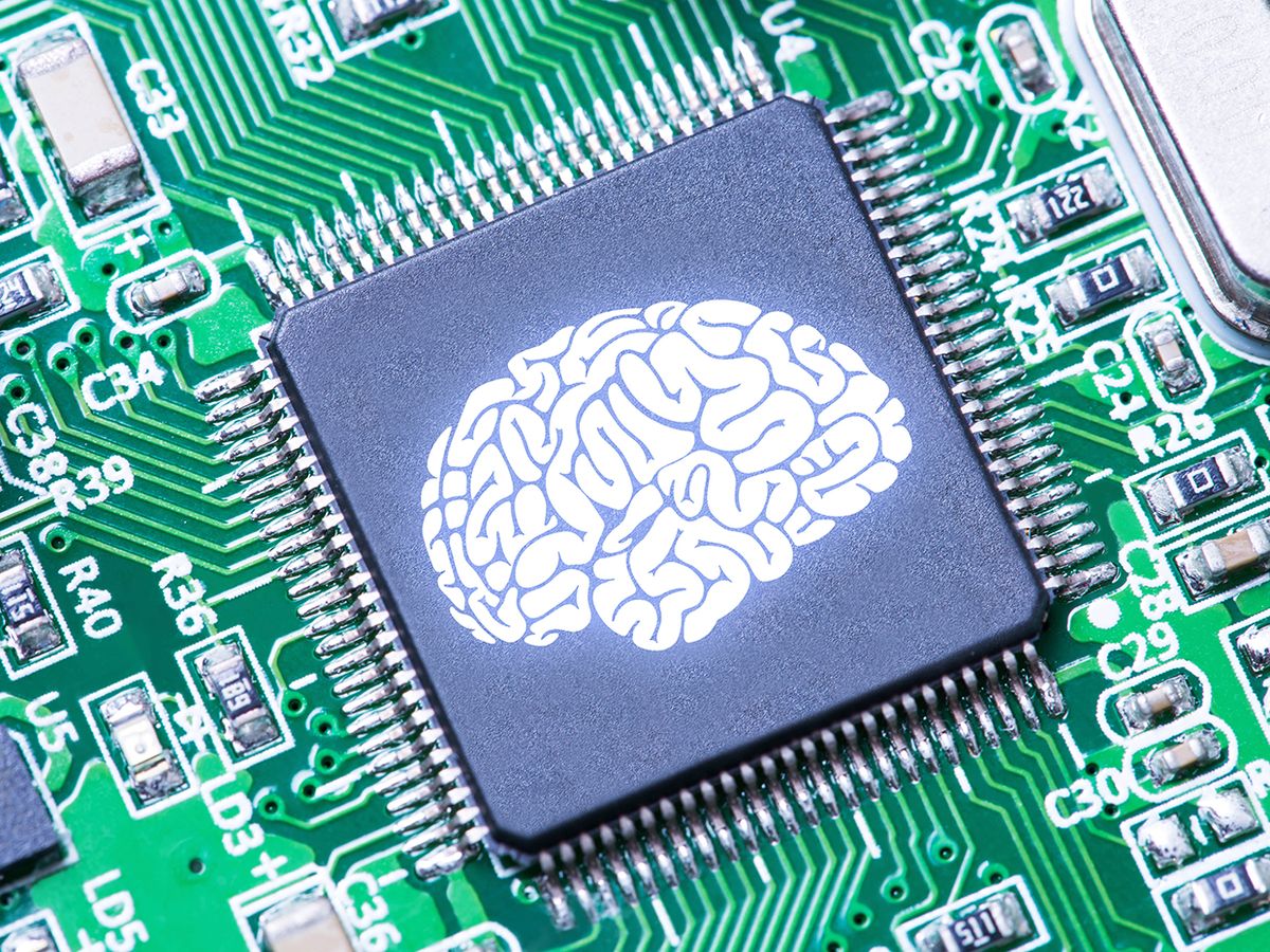 A computer chip with a brain illustration on it