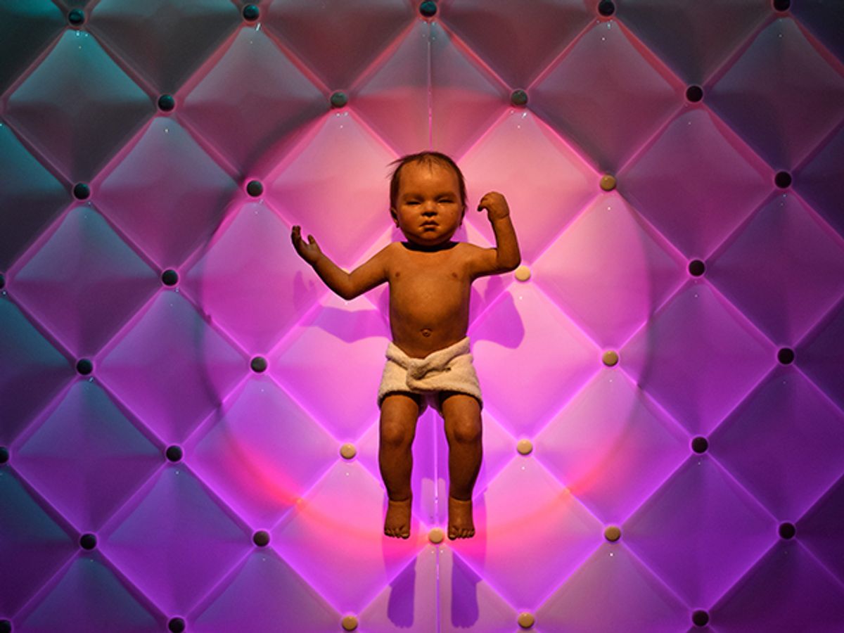 A creepy animatronic baby on display at the Science Museum