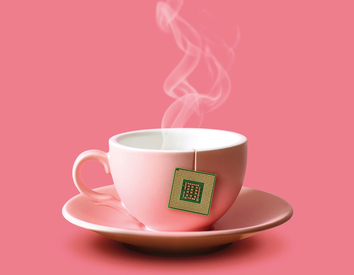 A cup of tea with a microchip at the end of the teabag string.