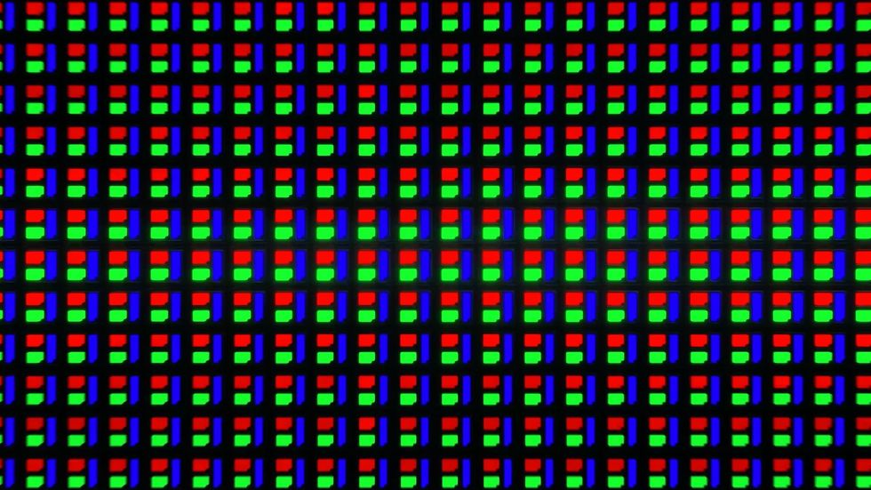 A grid of Micro-OLED pixels magnified so that each pixel's red, blue, and green sub pixels are defined.