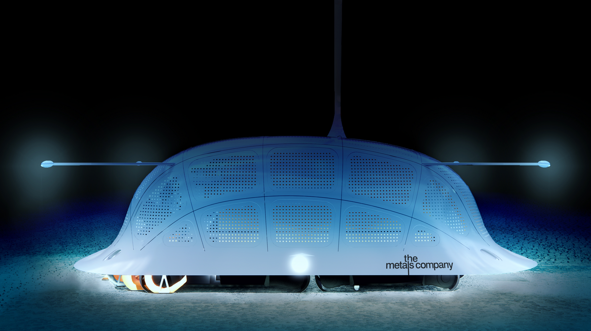 A large dome-shaped robotic vehicle for collecting polymetallic nodules rests on the bottom of the ocean. 