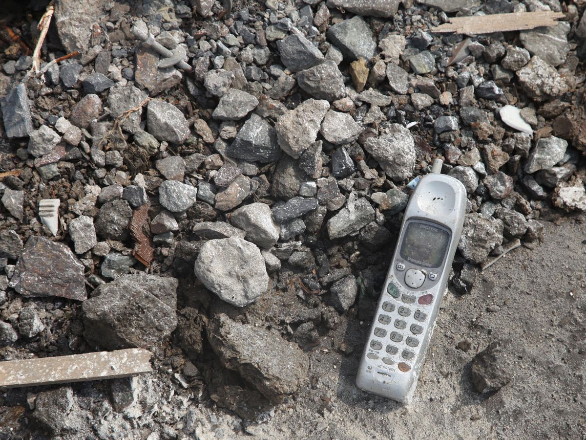 A mobile phone left in the rubble in Yamada, Japan after the 11 March 2011 earthquake