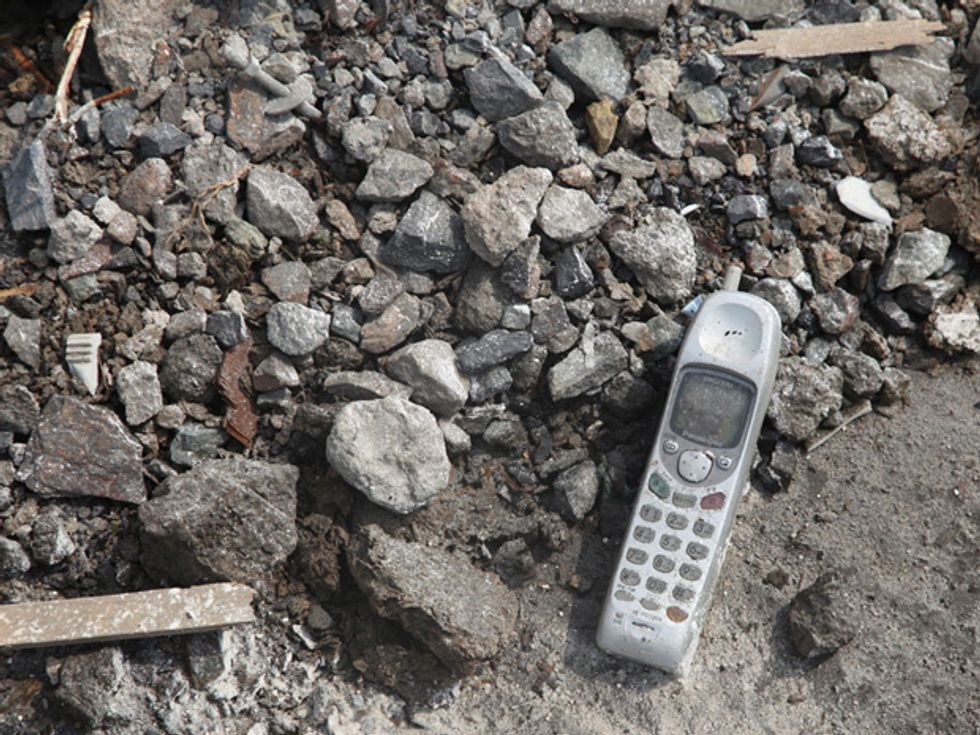 A mobile phone left in the rubble in Yamada, Japan