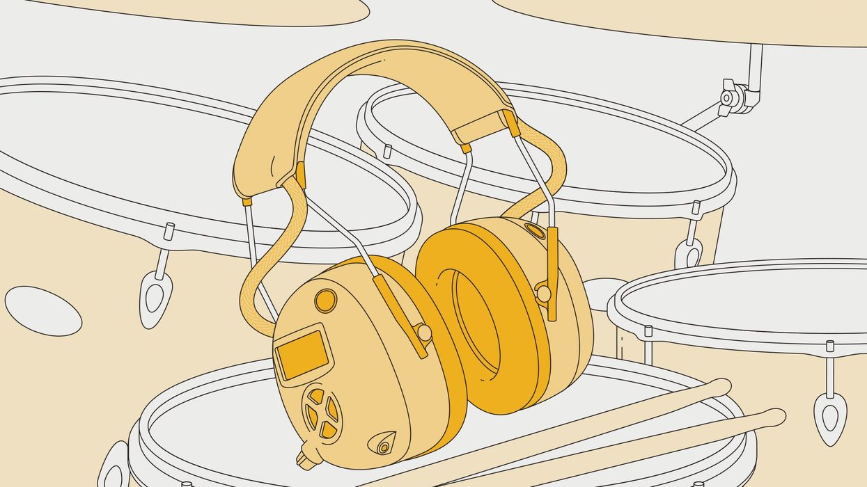a-pair-headphones-sitting-on-a-drum-set-