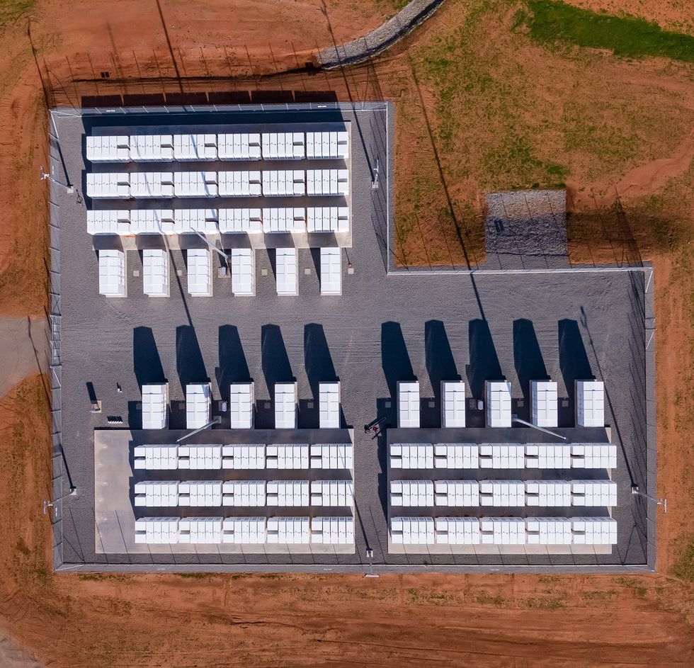 A photo of a field of white-squared batteries from above.  