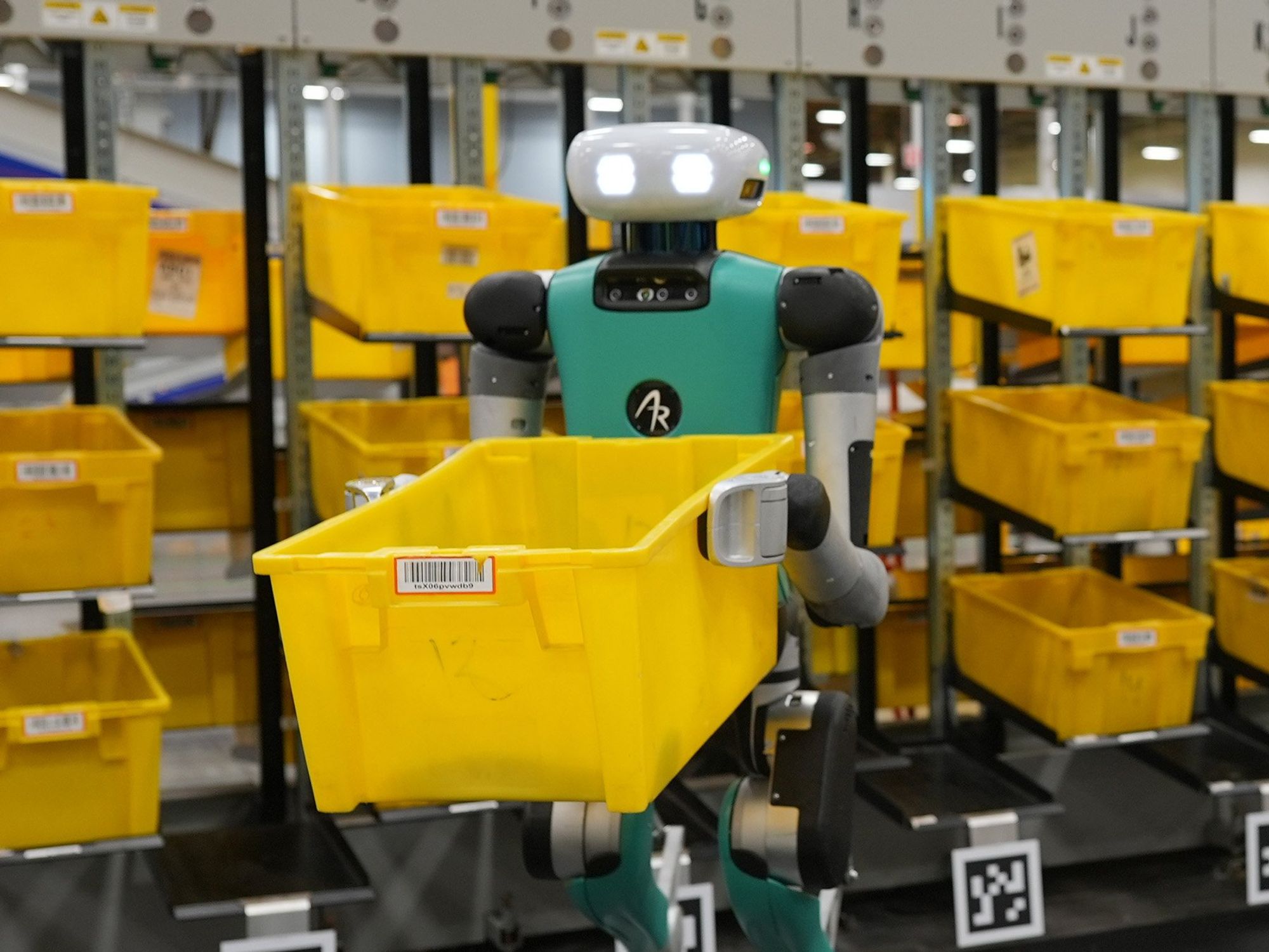 a-photo-of-a-robot-holding-a-container-i