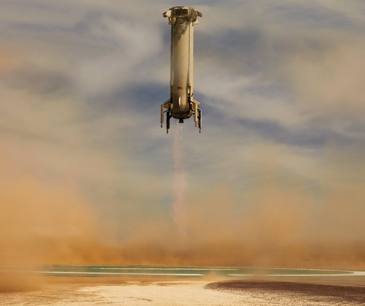 A photo of a rocket booster landing on a landing pad.  