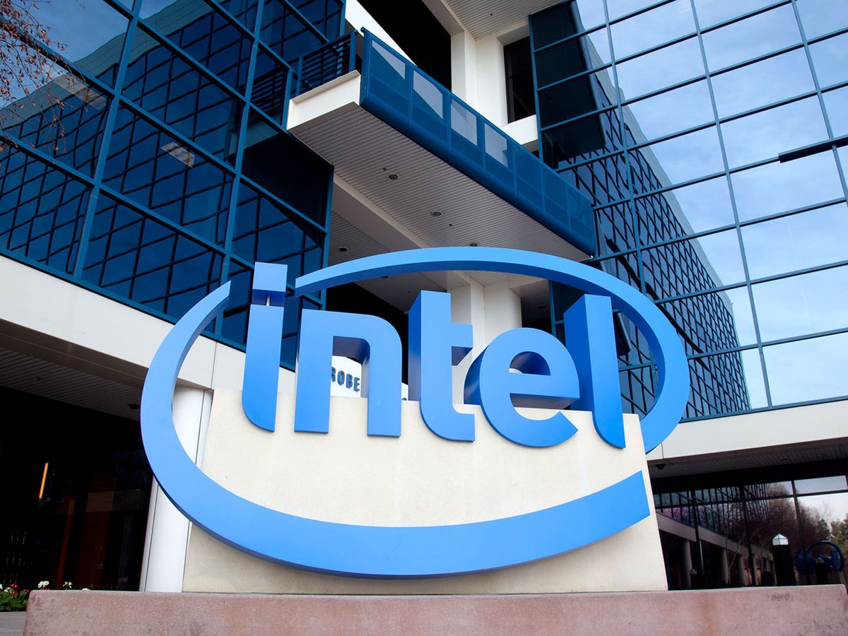 A photo shows the exterior of Intel's headquarters with the company's logo on prominent display.