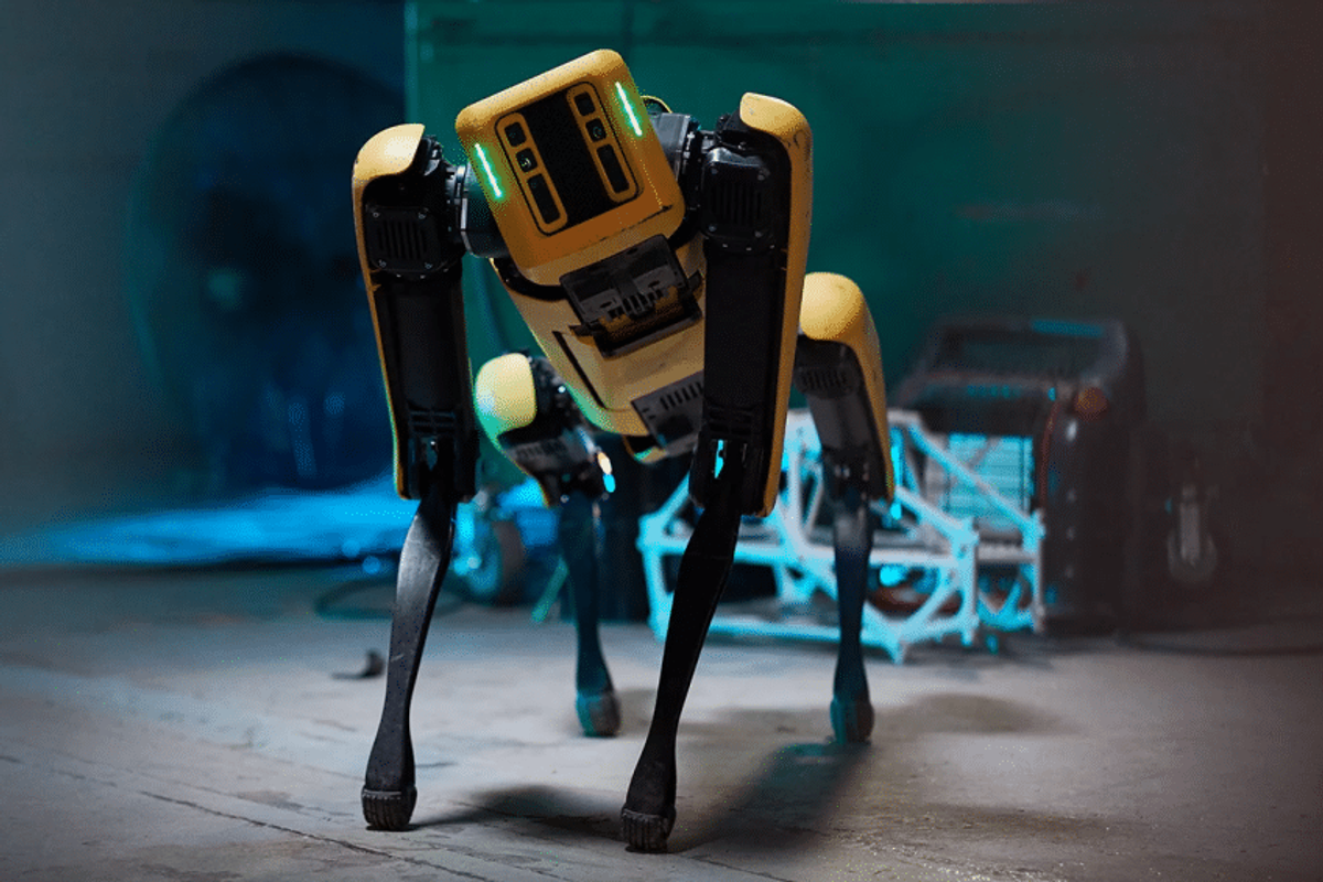 a-photograph-of-a-yellow-and-black-robot