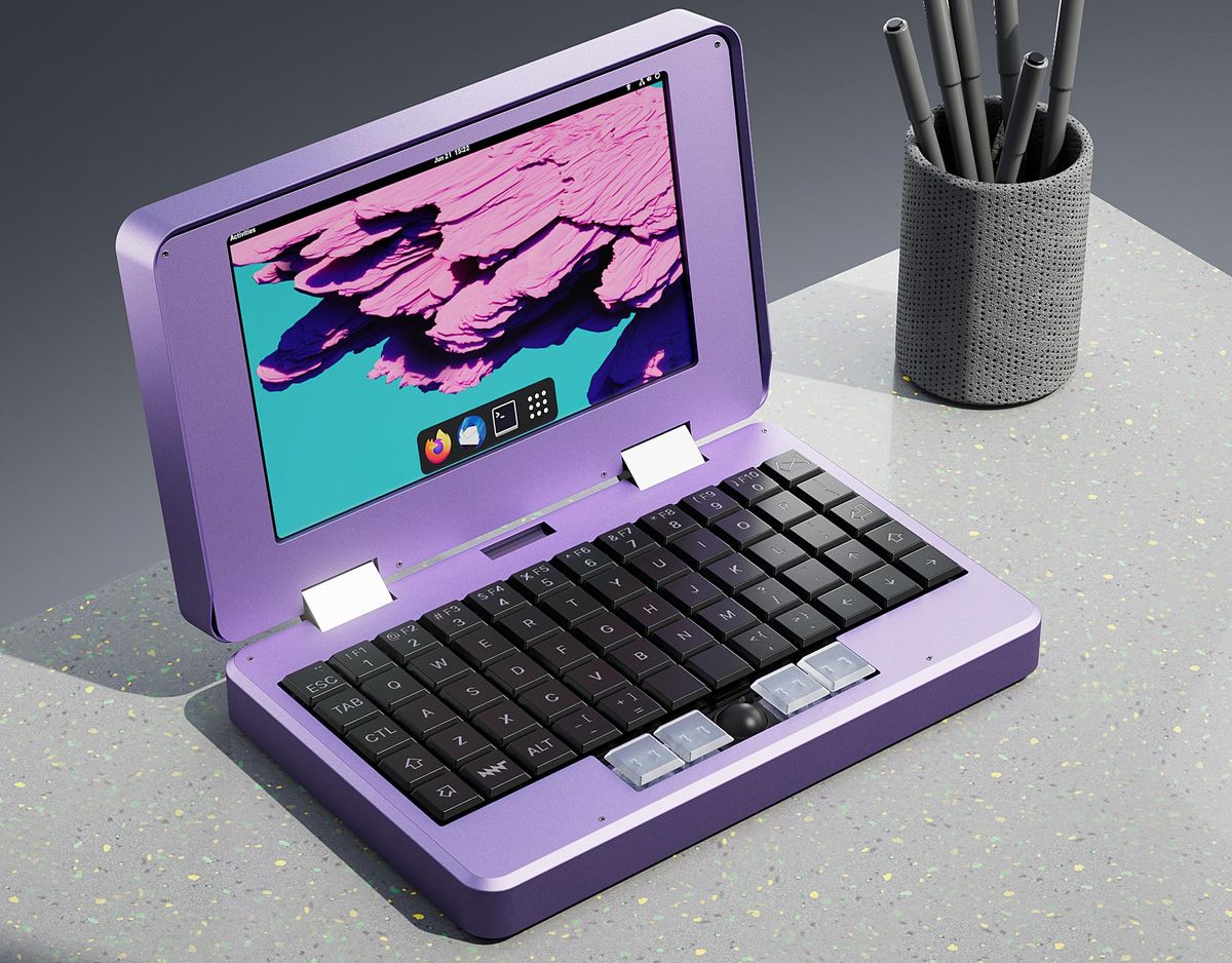 A purple laptop on a desk