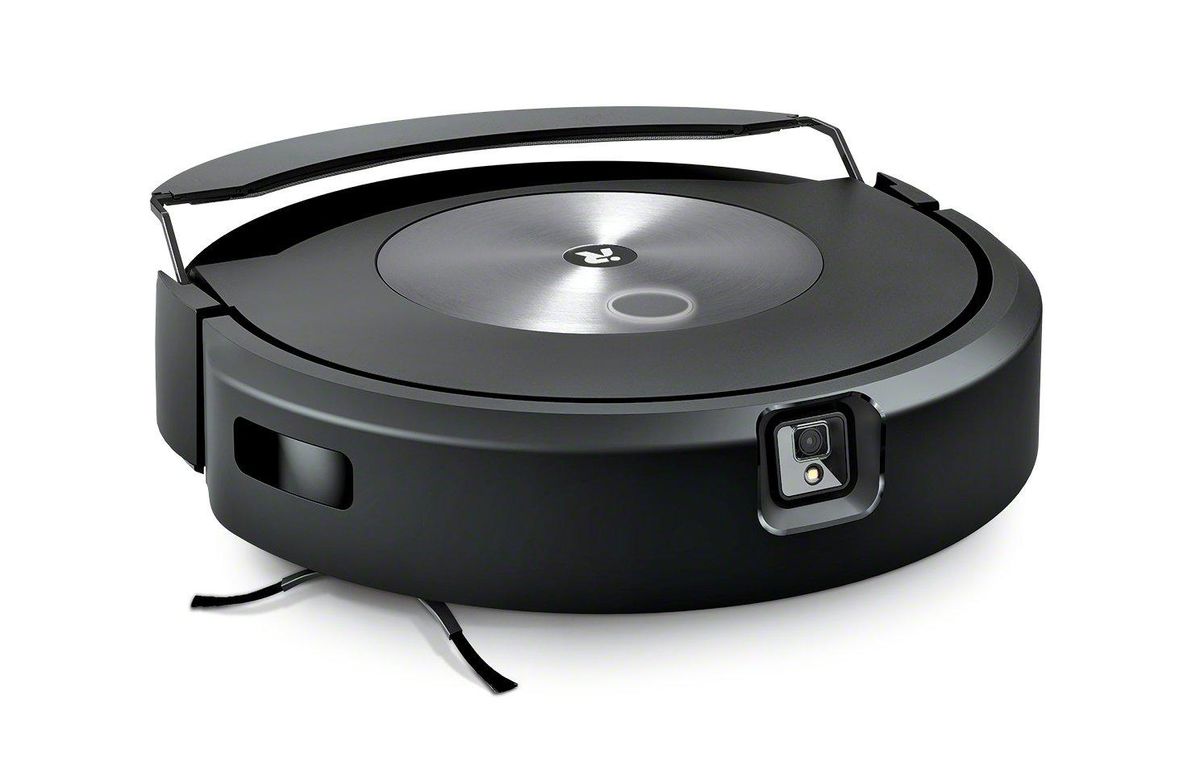 A round black robot vacuum with a mopping pad that can move from below the robot to above the robot and out of the way