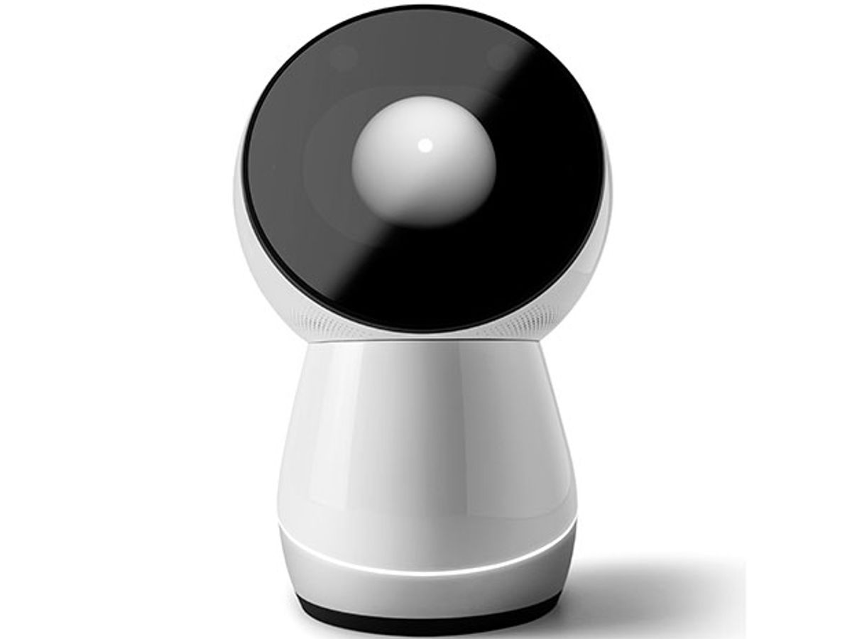 A rounded white robot that look like it has a giant eye with a black pupil and white iris