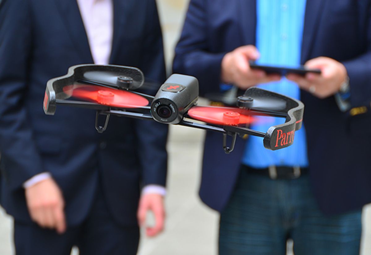 A small black and red quadcopter