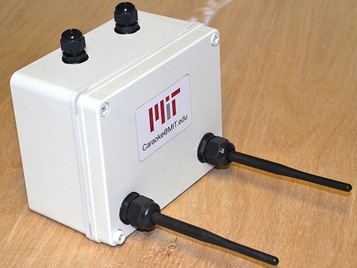 A small off-white plastic box with two protruding black antennas