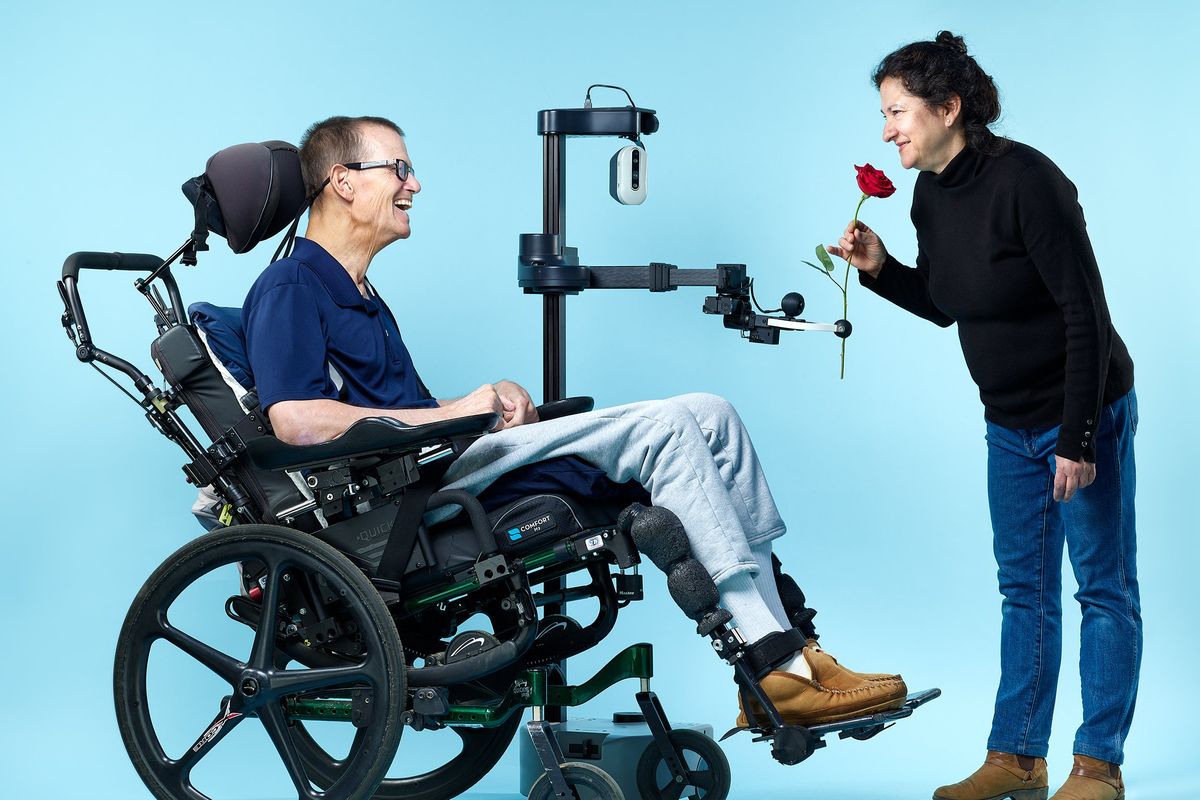 a-smiling-man-in-a-wheelchair-connects-e