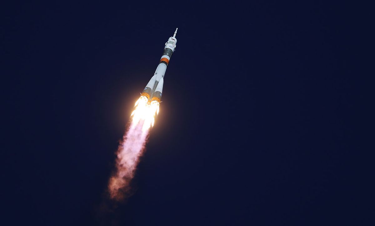 A Soyuz-FG rocket booster blasts off from the Baikonur Cosmodrome carrying the Soyuz MS-10 spacecraft with Roscosmos cosmonaut Alexei Ovchinin and NASA astronaut Nick Hague prior to failure.