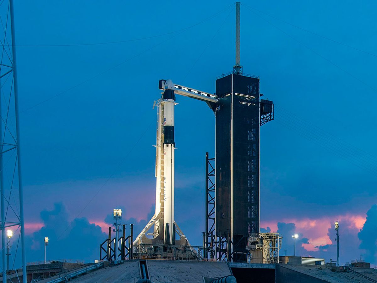 A SpaceX Falcon 9 rocket with the company's Crew Dragon spacecraft onboard is seen on the launch pad at Launch Complex 39A on May 26, 2020.
