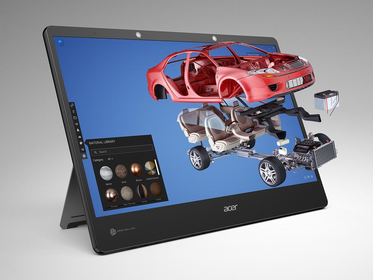 A standing tablet computer shows a blow out of a car that appears to be coming out of the display. 