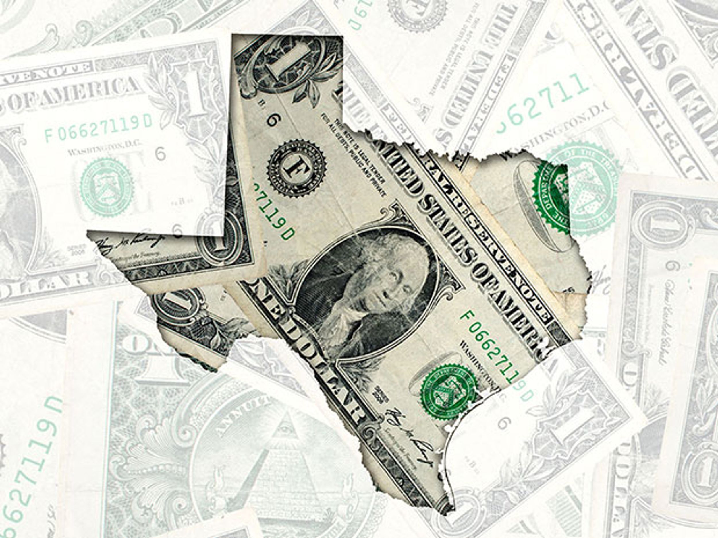 A torn dollar bill in the shape of the state of Texas