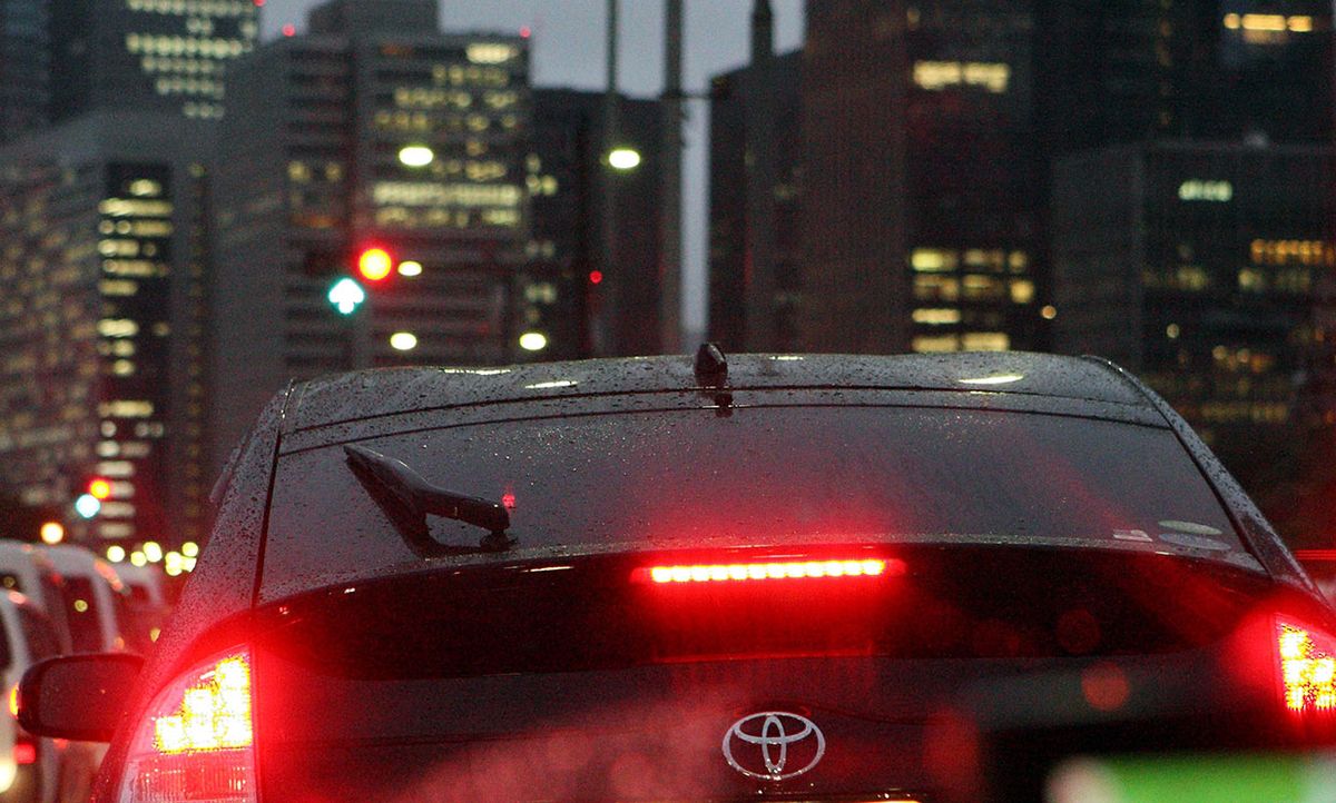 A Toyota Prius hybrid car utilizing its brakes in Tokyo, Japan, on Wednesday, Sept. 8, 2010.