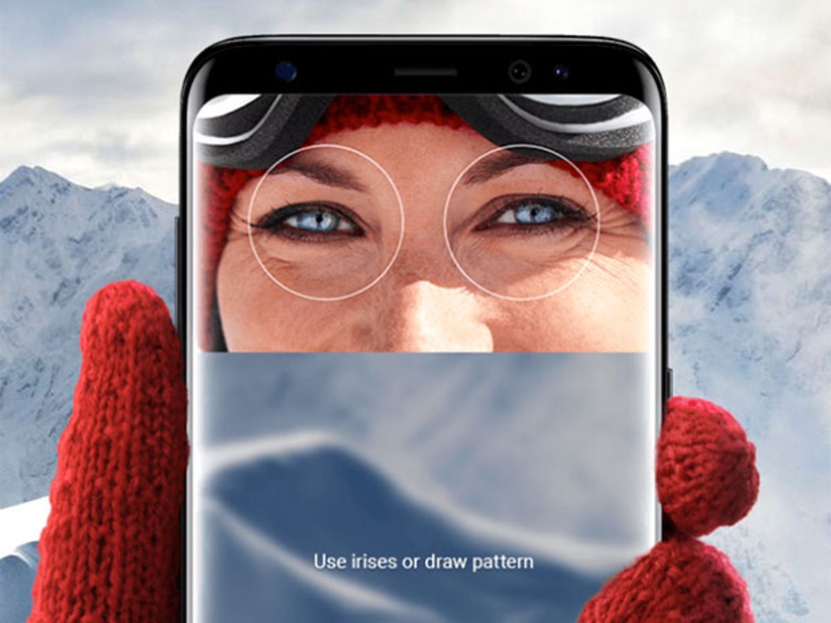 A user holds up a new Samsung Galaxy S8, to demonstrate the smartphone's iris scanning preview screen, which shows two circles that users can rely on as a guide to position their eyes..
