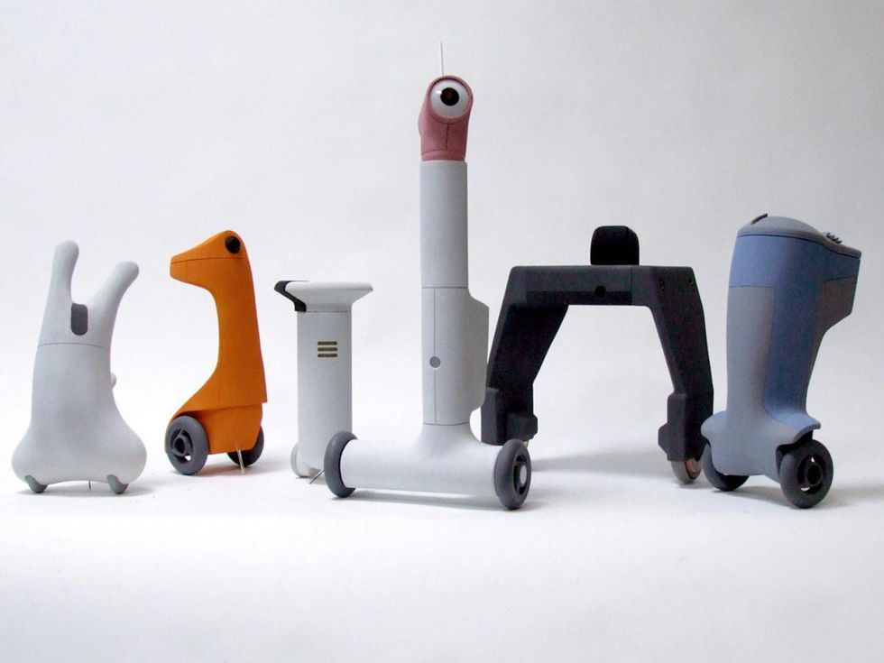 A variety of two wheeled balancing robots in strange shapes and colors