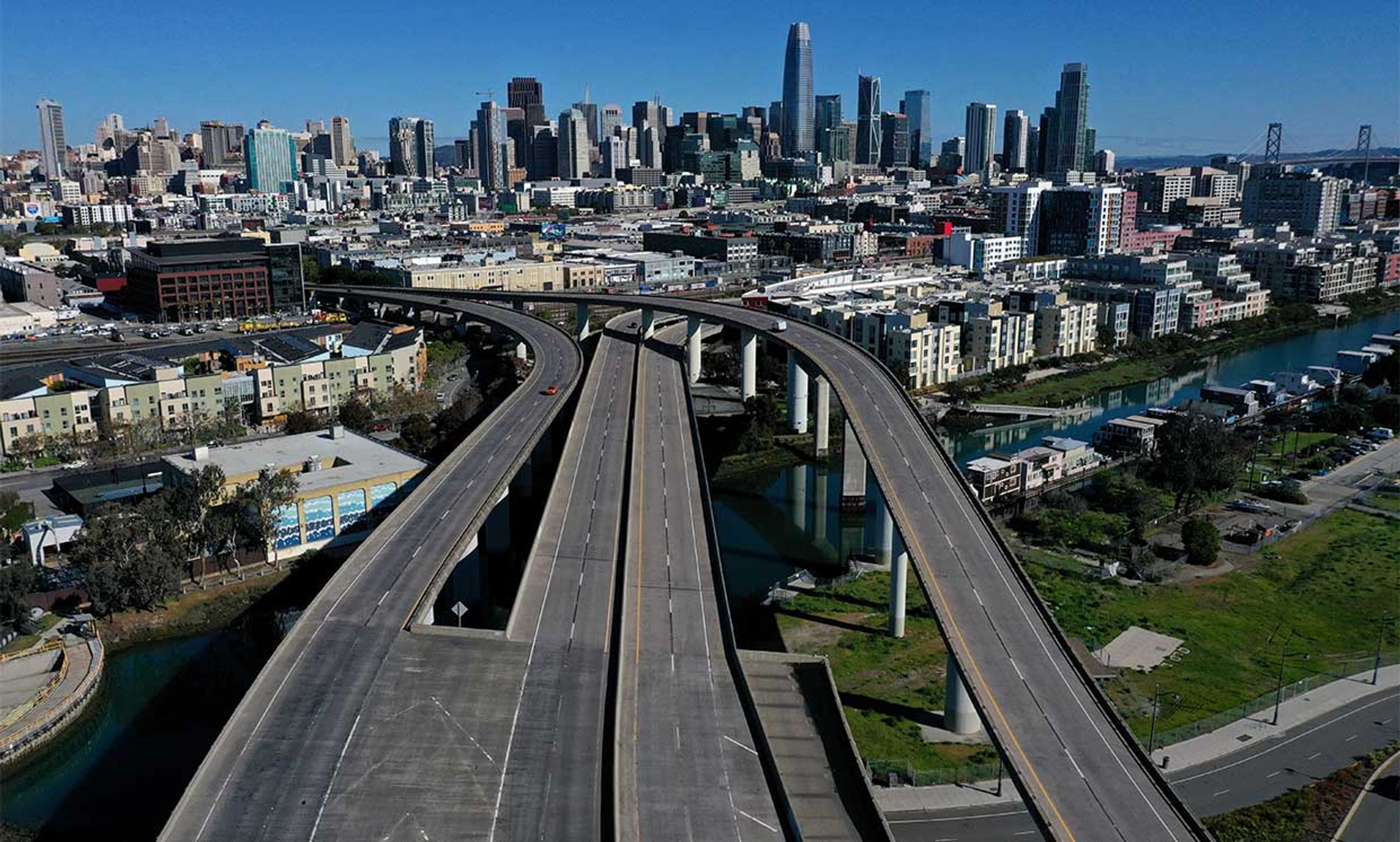 An aerial view from a drone shows an empty Interstate 280 on March 26, 2020 leading into San Francisco, California.
