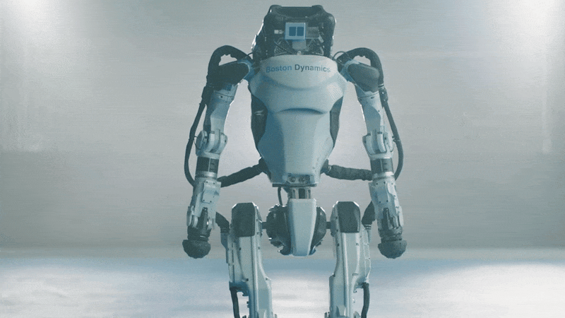 An animated gif of a white humanoid robot bowing to the camera.