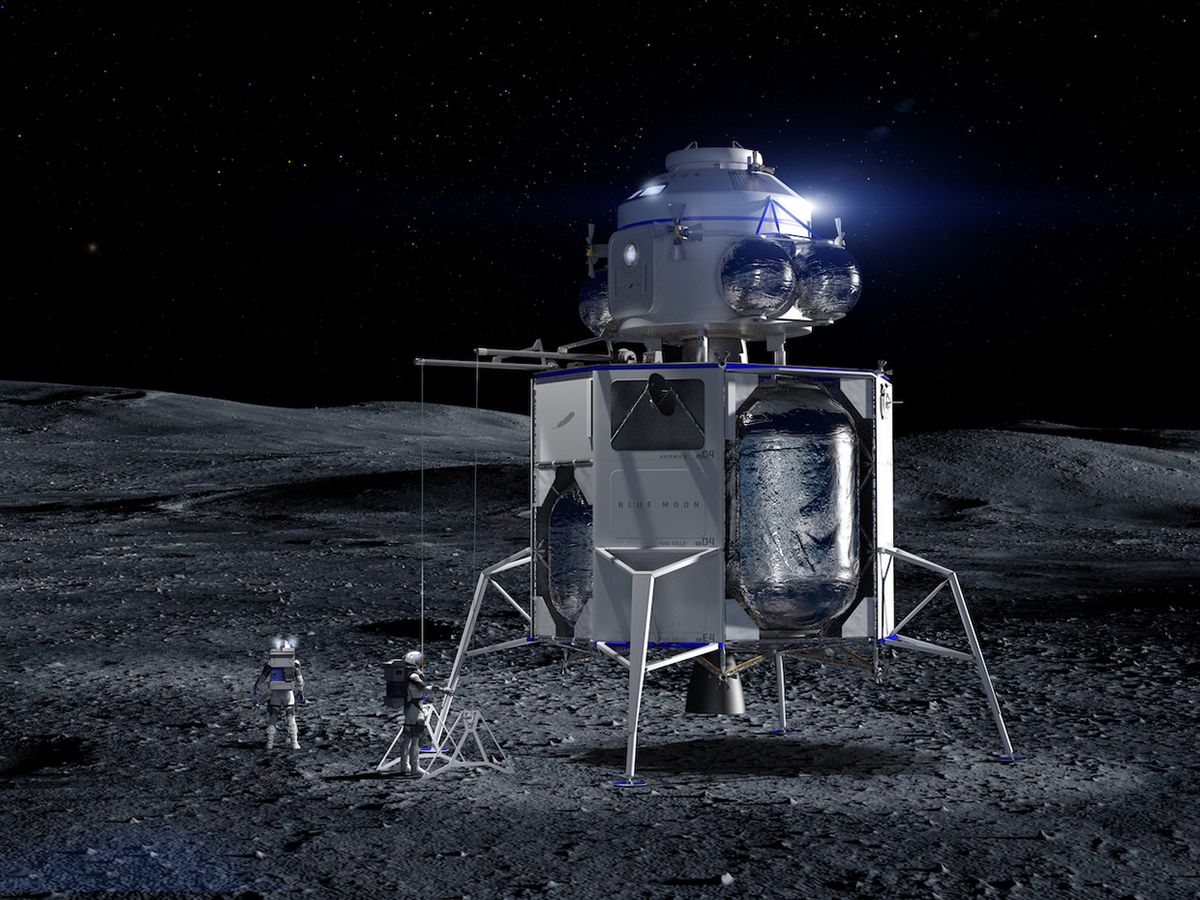 An artist's conception shows two astronauts standing on the moon next to a metallic lander consisting of four legs, a boxy midsection, and a rounded module on top.