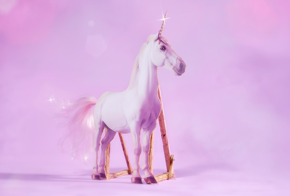 An illustration of a unicorn held up by a stand.