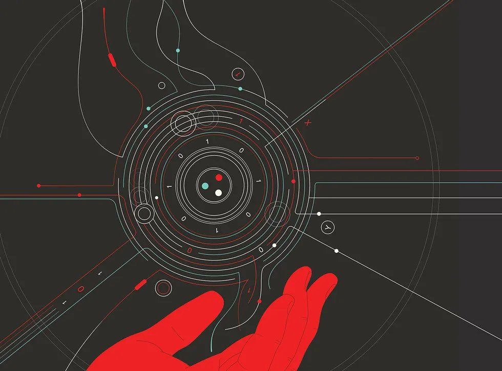 An image of a red hand with a complicated circular device