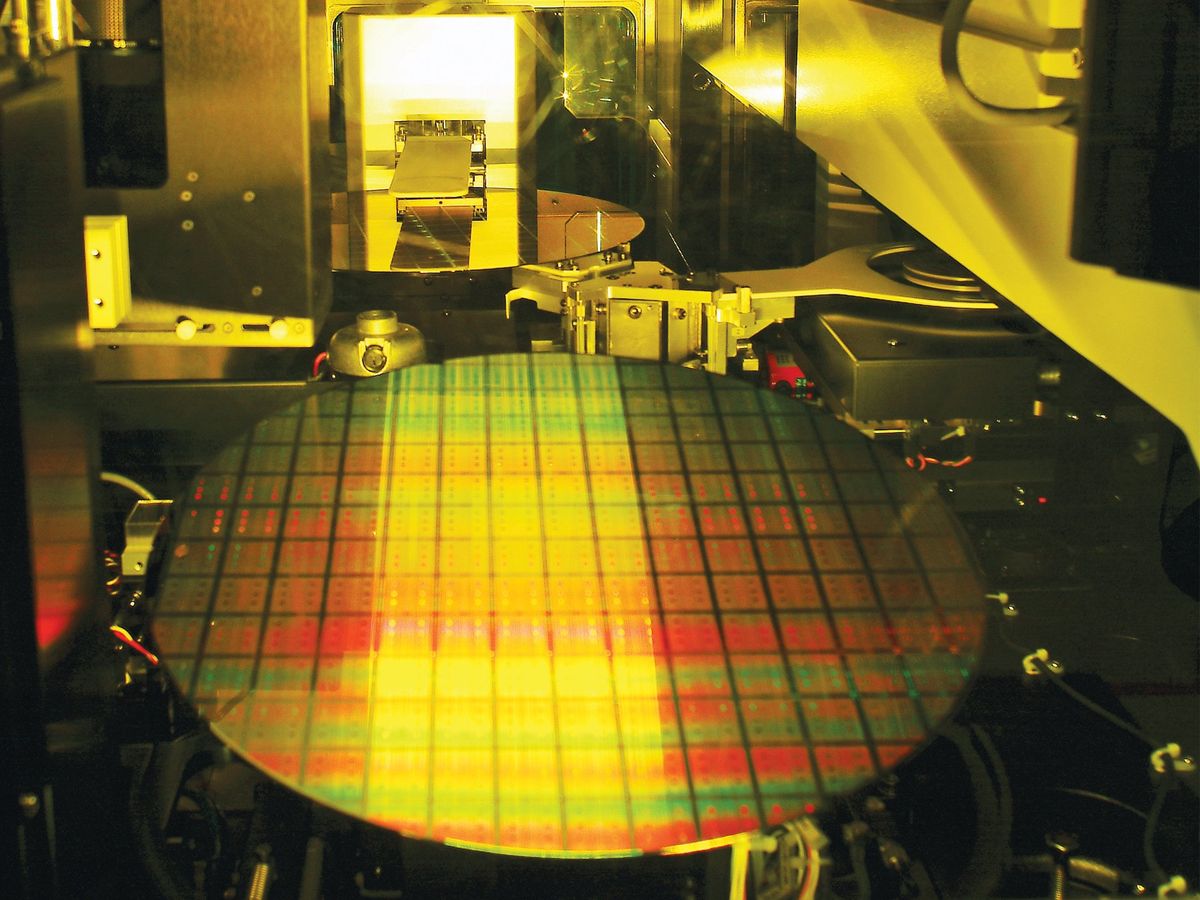 An image of a silicon wafer in a fab.
