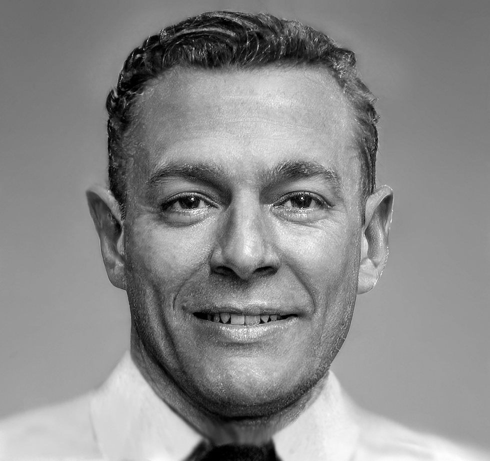 An image of a smiling man.